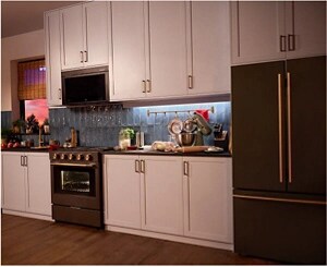 A suite of Juniper appliances in a kitchen.