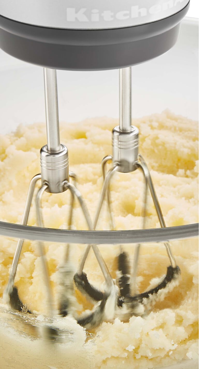 Flex Edge Beaters mixing dough.
