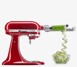 An Artisan® Series 5 Quart Tilt-Head Stand Mixer with a 7 Blade Spiralizer Plus with Peel, Core and Slice Attachment.