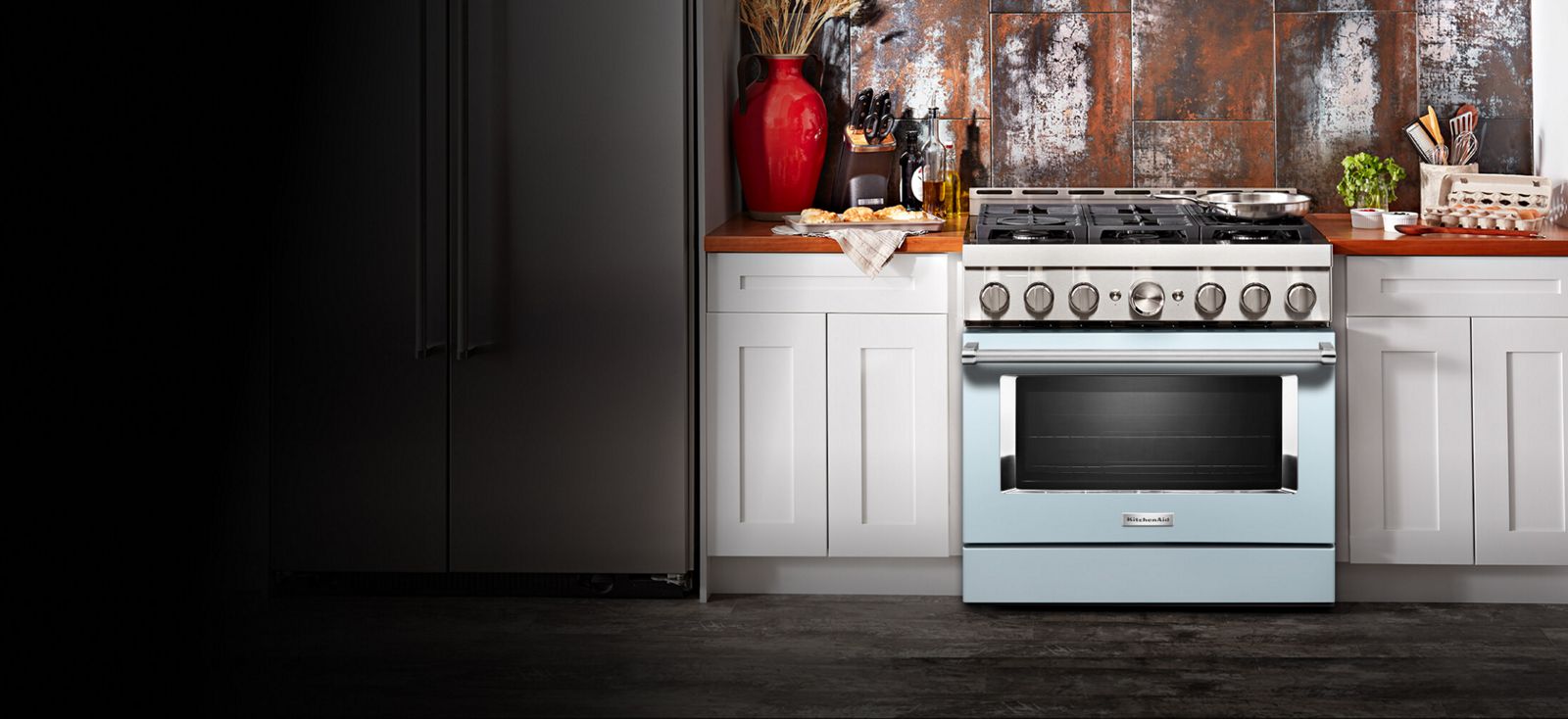 Kitchen with an ink blue range.
