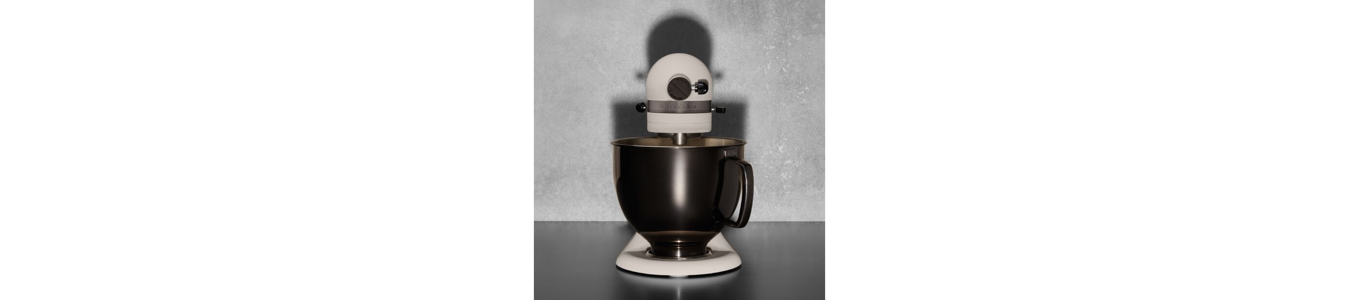 A Limited Edition Stand Mixer with Black Stainless Bowl on a kitchen counter.