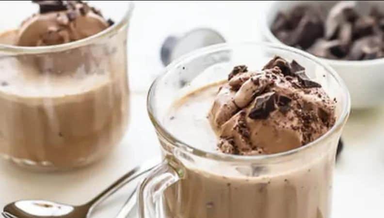 Chocolate affogato in cups, garnished with chopped-up chocolate.