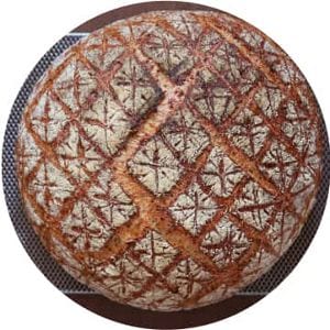 A quilt design on baked bread.