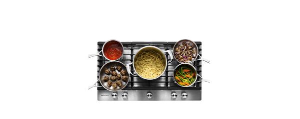 KitchenAid® Cooktop with cast iron grates.