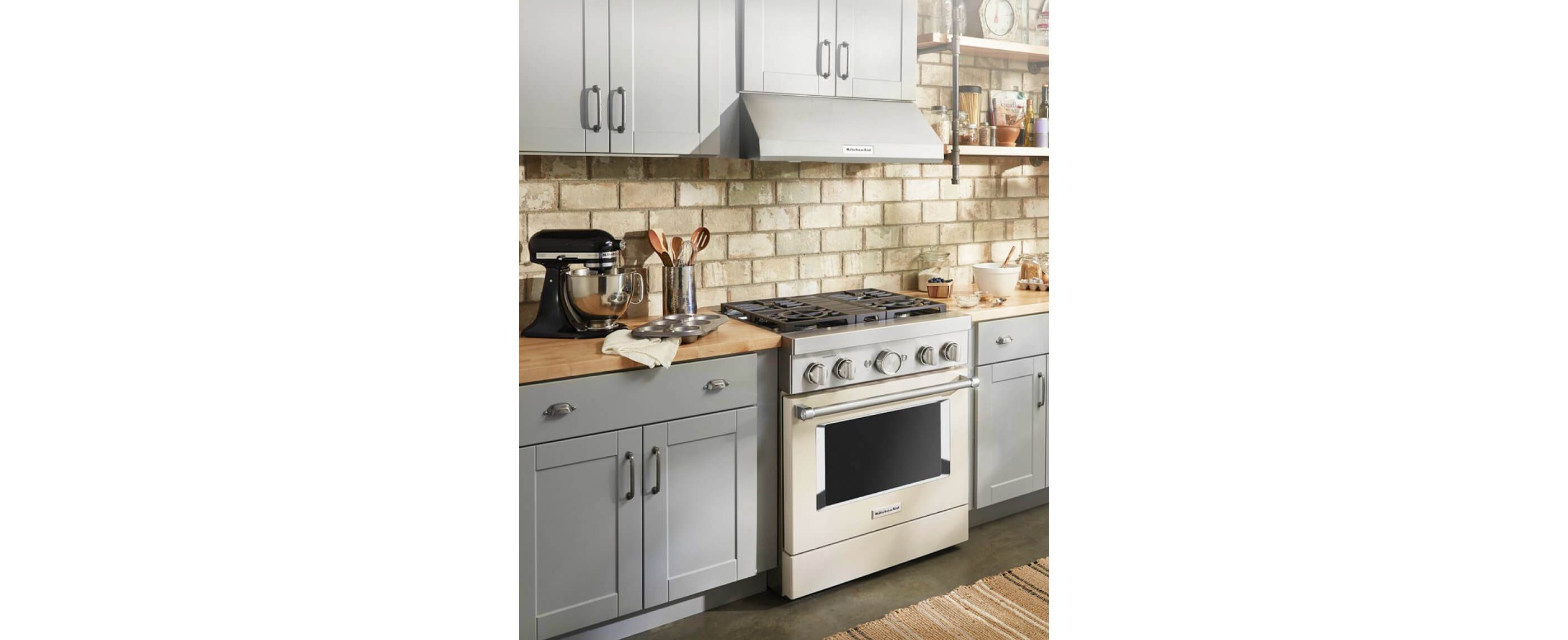 Kitchen setting with KitchenAid® range oven as the focal point