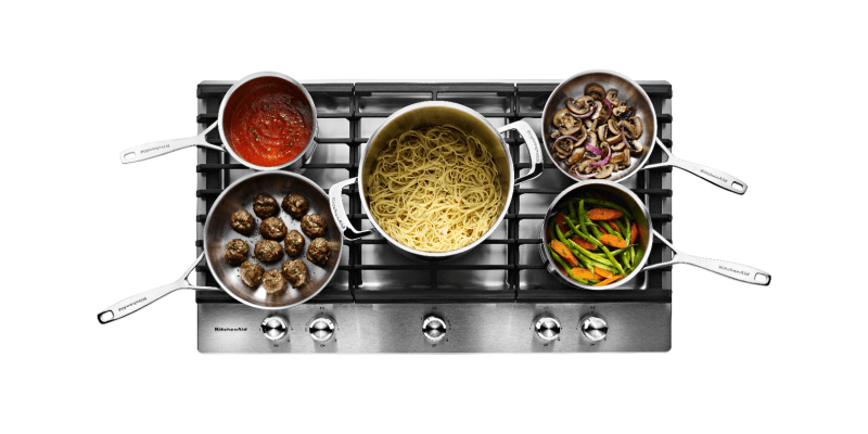 A 5-Burner Gas Cooktop with cast-iron grates.