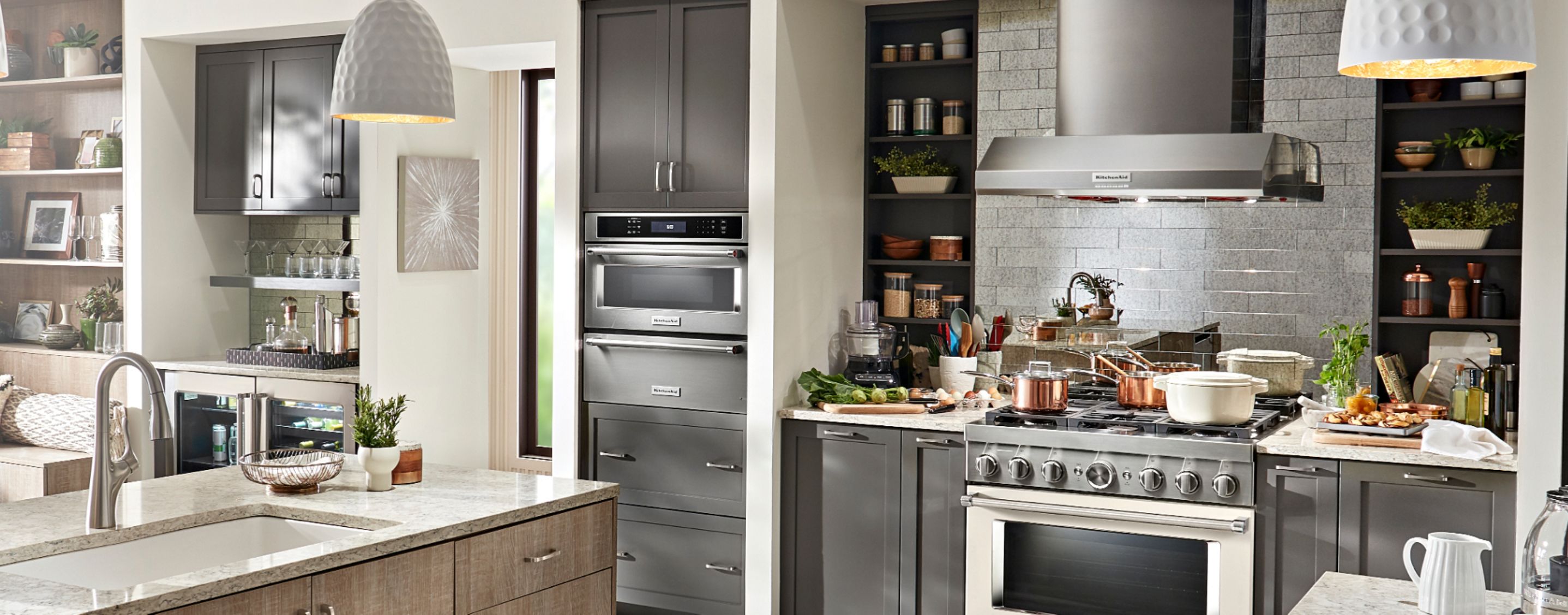 A light colored kitchen with KitchenAid® appliances.