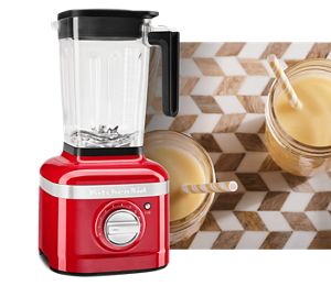 An overhead close-up corn juice in
                              glass with straw