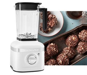 An overhead close-up Hazelnut
                              cookies on baking track and
                              placed on white plate