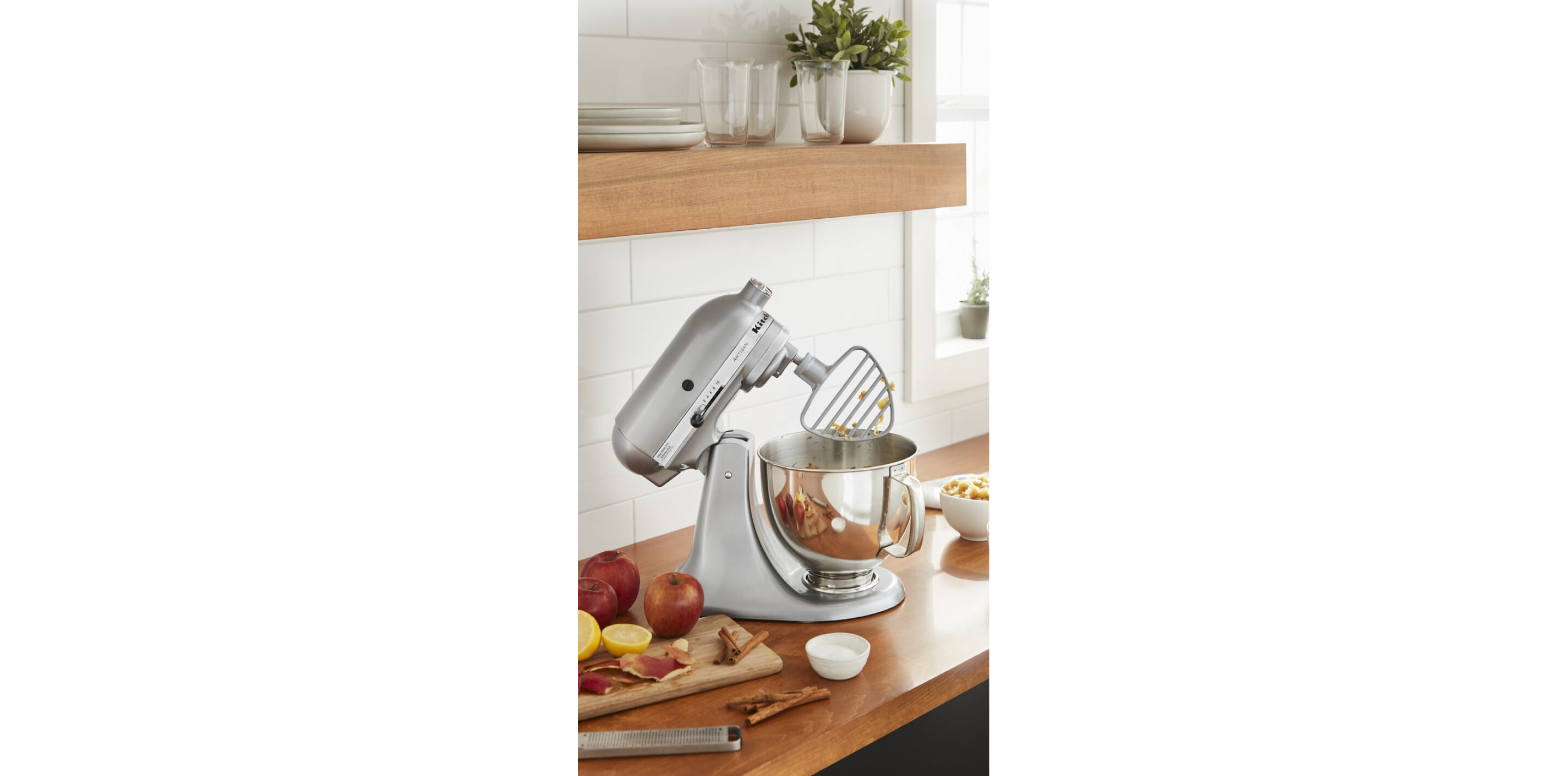 A silver KitchenAid® Stand Mixer with Pastry Beater Accessory.