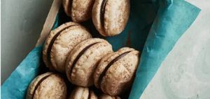 Delicious-looking dessert cookies with a rich ganache filling.