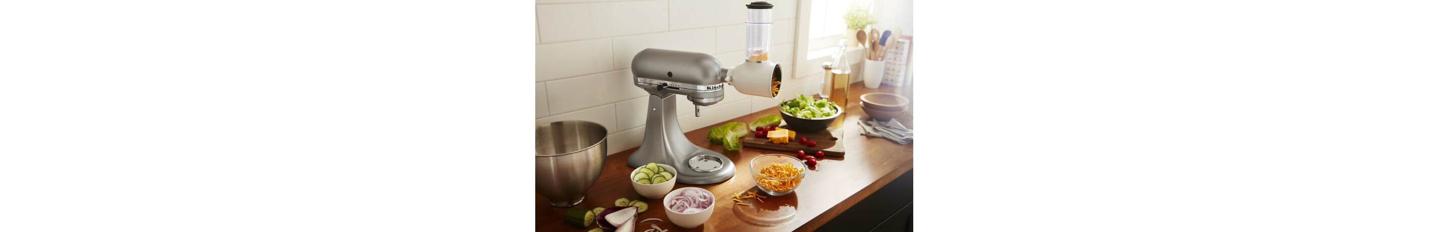 A Fresh Prep Shredder Attacment shredding cheese.