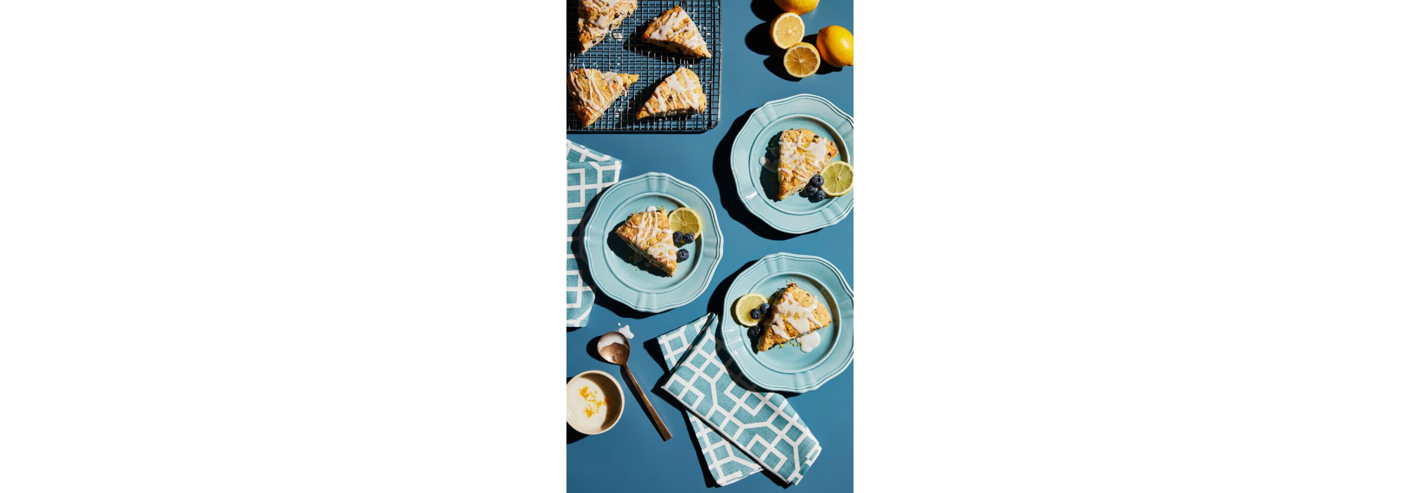 Blueberry lemon scones on teal plates