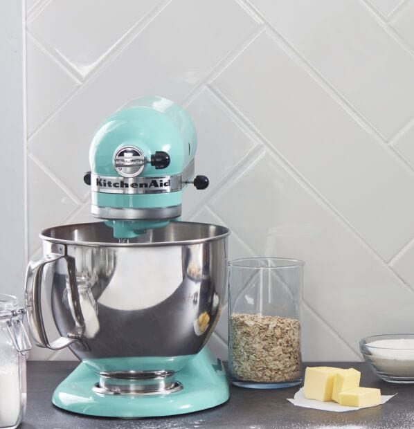 Aqua Sky KitchenAid® stand mixer on a counter with oats and butter
