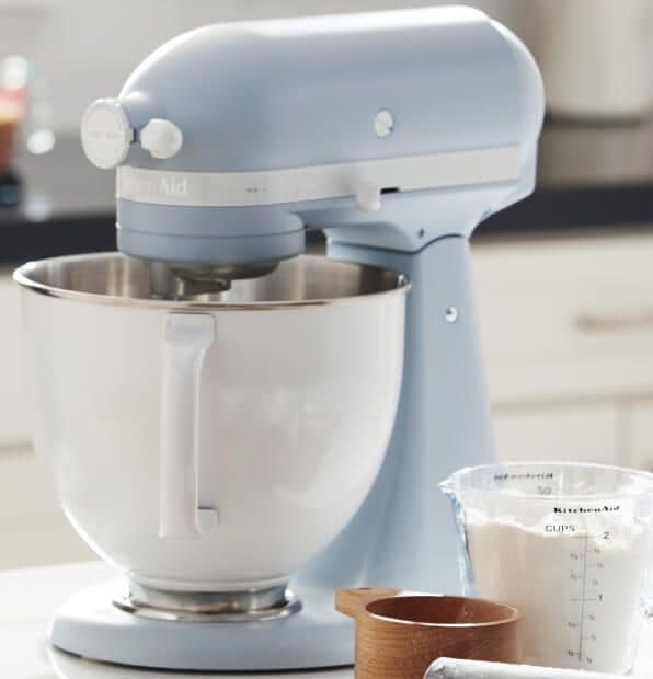 Blue Velvet KitchenAid® stand mixer on a counter with baking ingredients