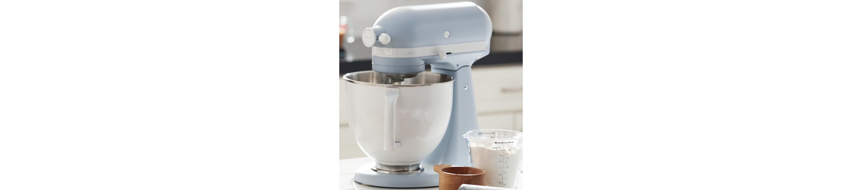Blue Velvet KitchenAid® stand mixer on a counter with baking ingredients