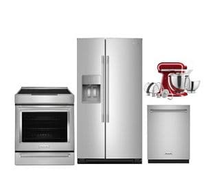 A suite of KitchenAid® appliances, featuring a 4-door refrigerator, double wall oven and various countertop appliances.