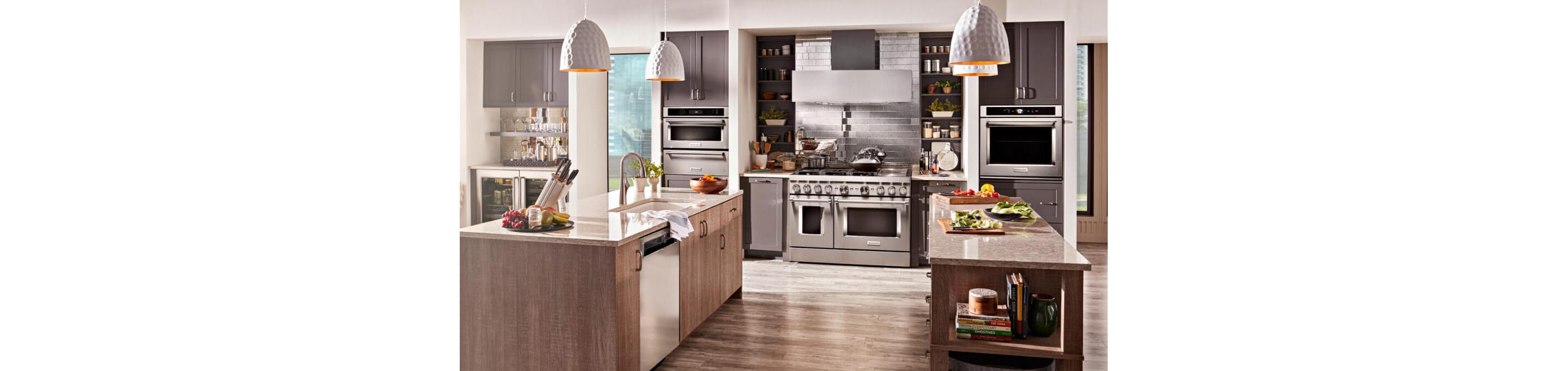 A contemporary kitchen with KitchenAid Appliances.