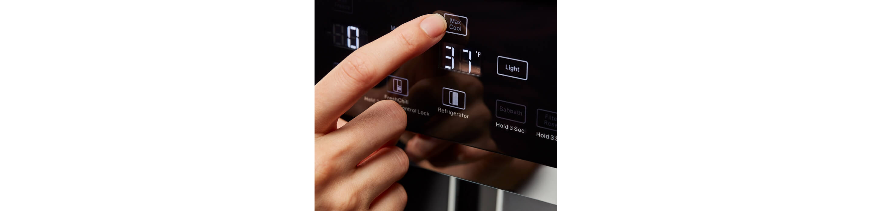 A person selecting the Max Cool control on the KitchenAid® Built-In Side-by-Side Refrigerator