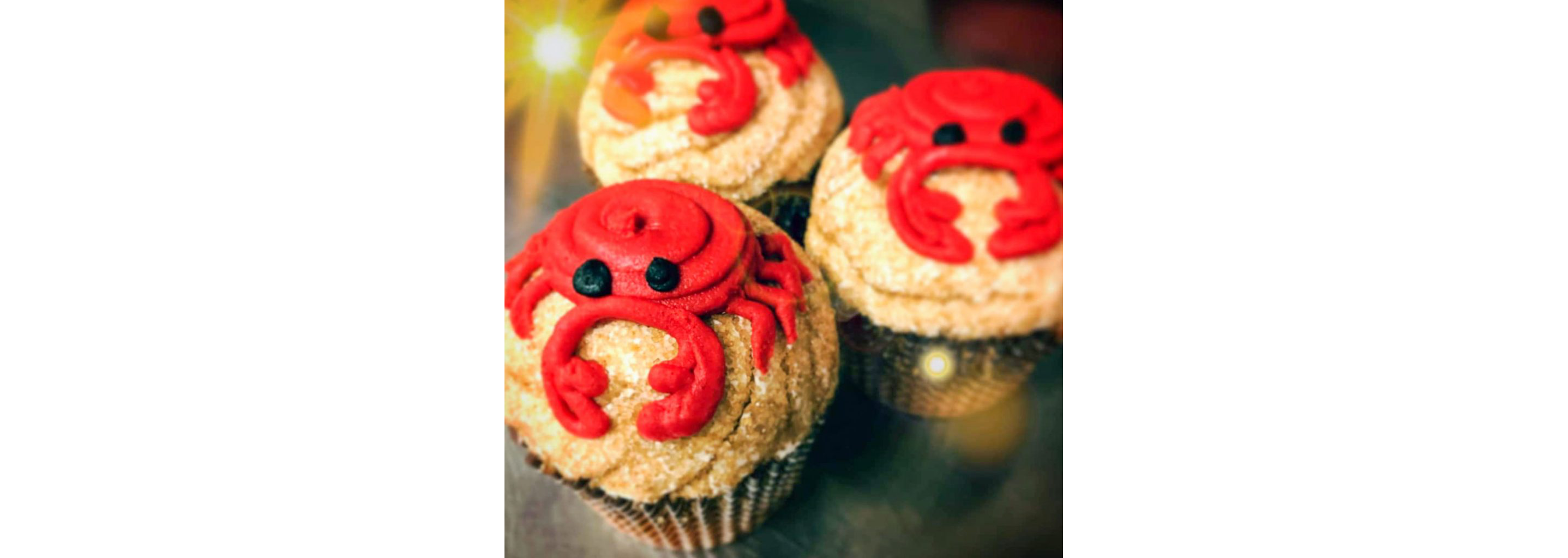 Cupcakes from The Happy Mixer Gluten Free Bakery with crabs made of icing.
