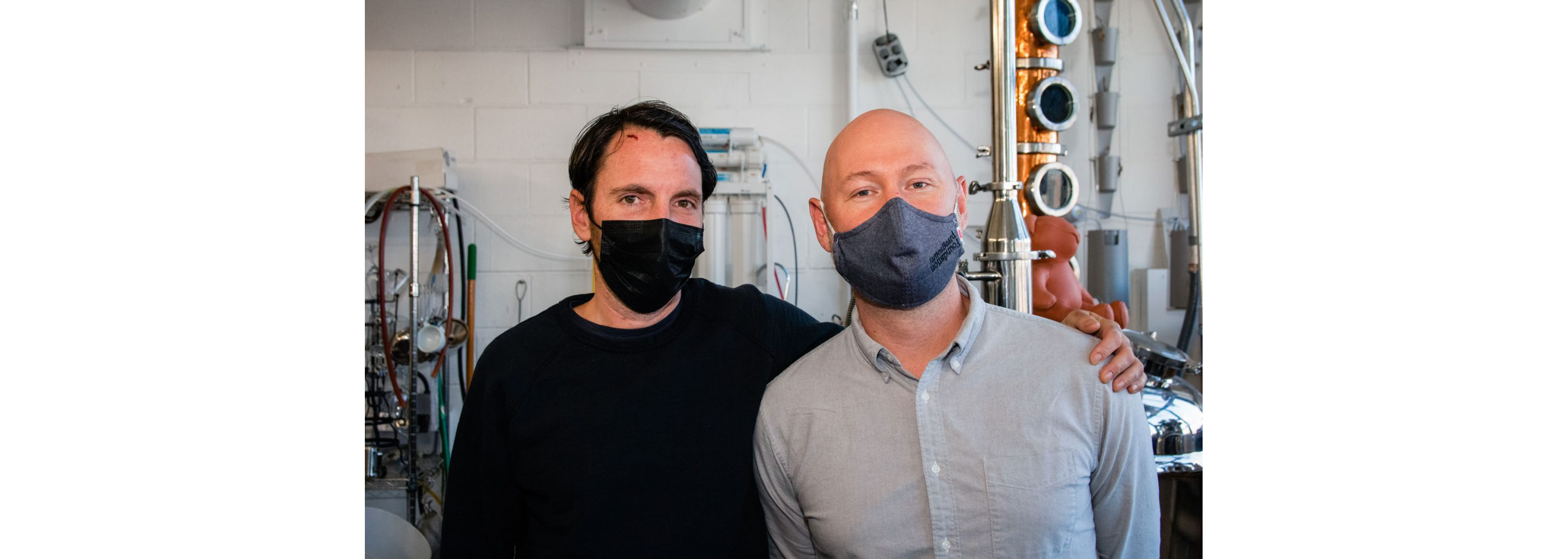 Aaron Sing Fox and Daniel de la Nuez posing for a photo.