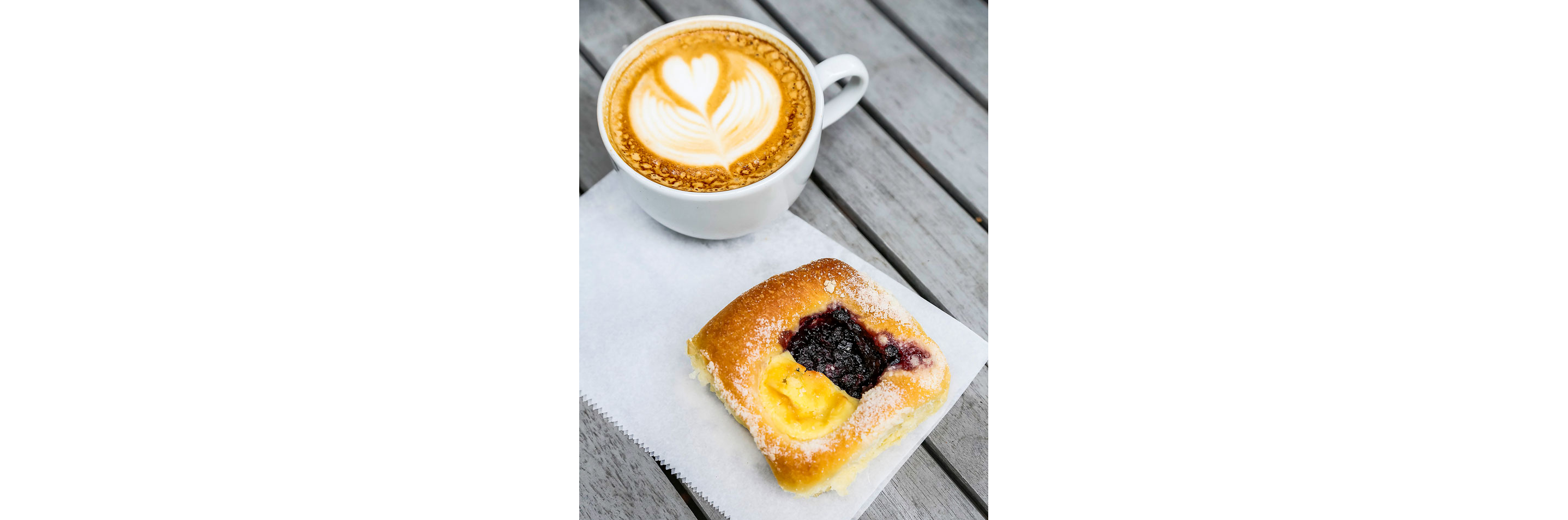 A latte and a sweet kolache.