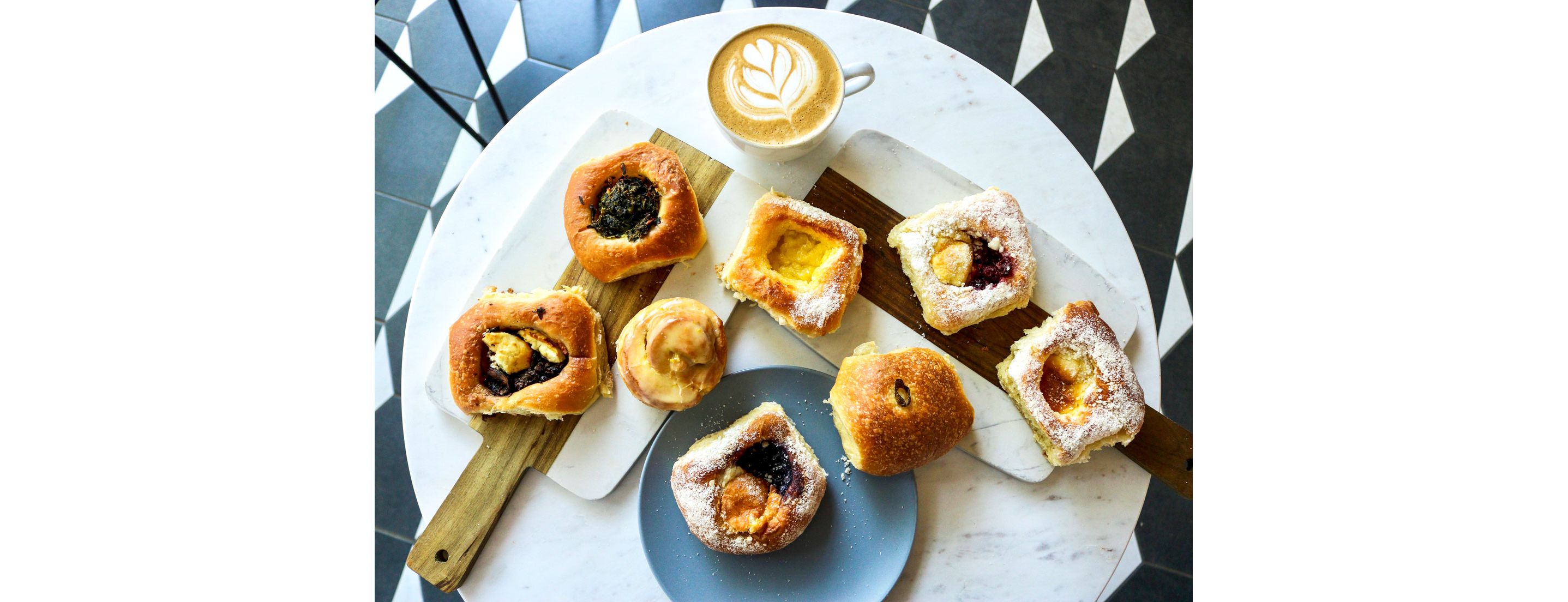 Cutting boards topped with kolaches.