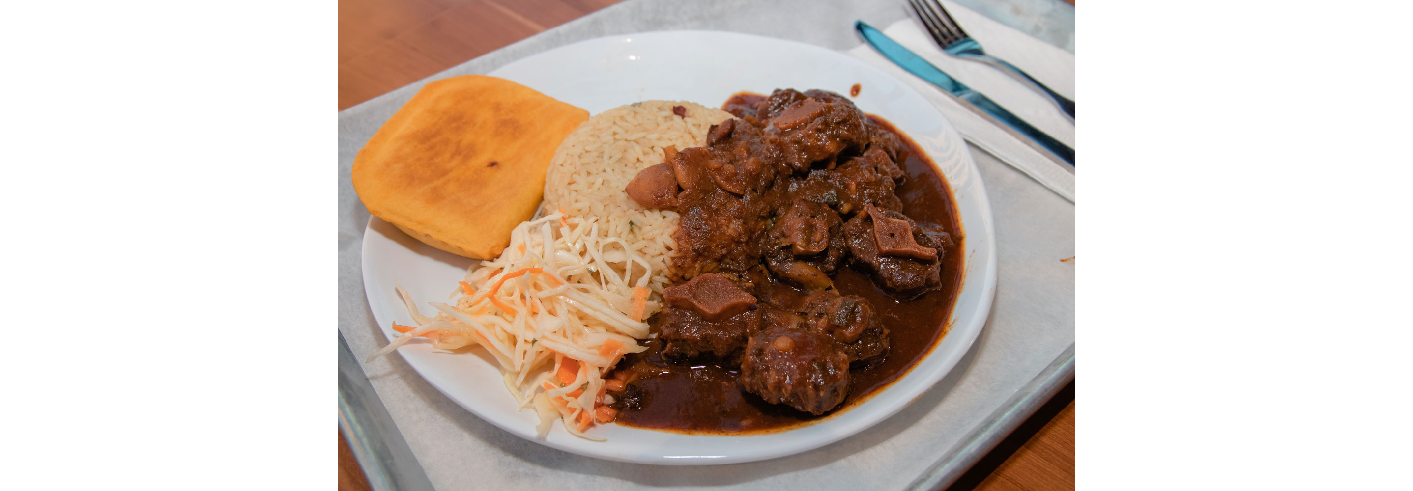 A plate of hearty, delicious Jamaican food.
