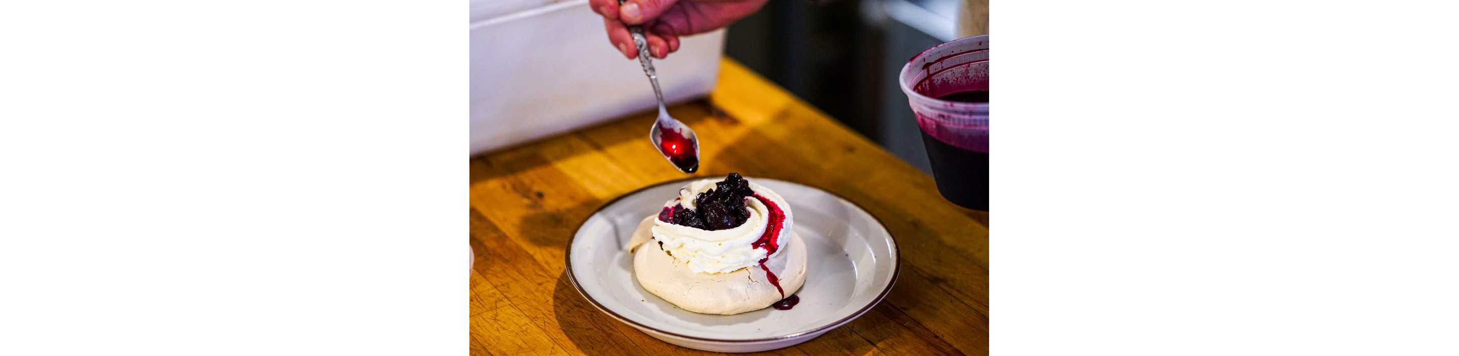 A pastry topped with beetroot sauce.