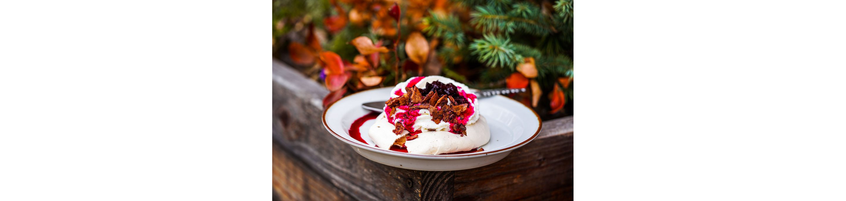 A pastry topped with beetroot sauce.