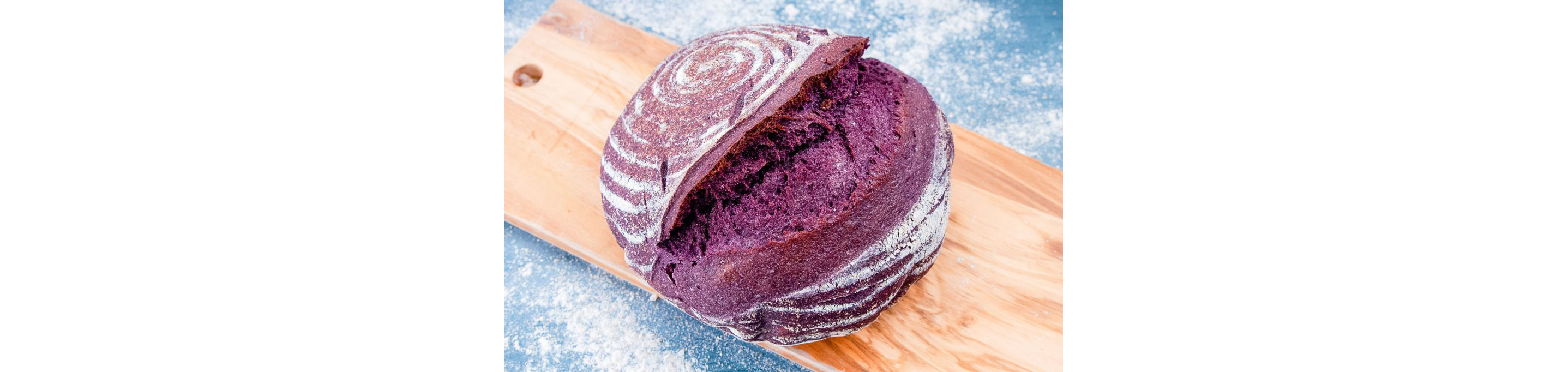 A freshly baked blue sourdough bread.
