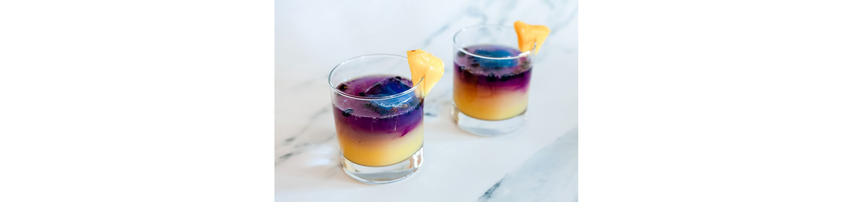 Cocktails made with butterfly pea flower tea.