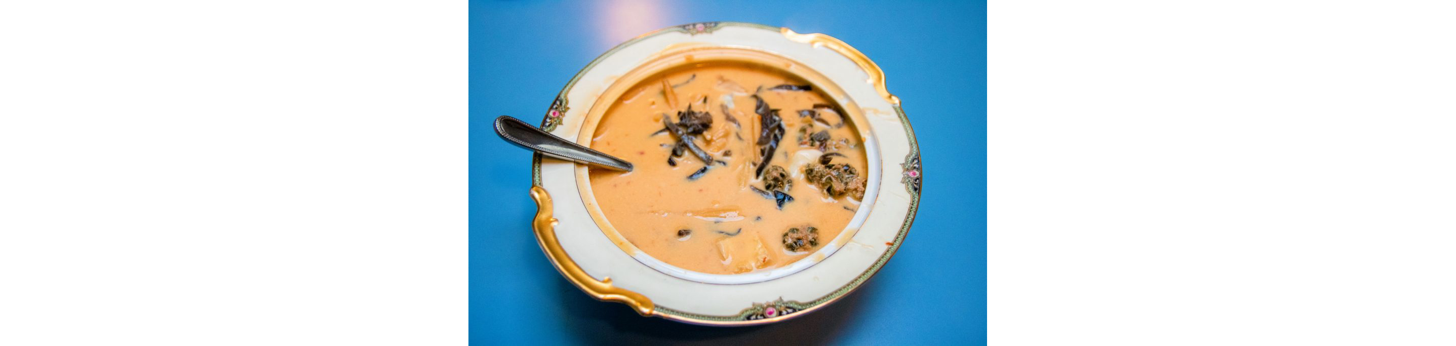 A bowl of creamy soup.