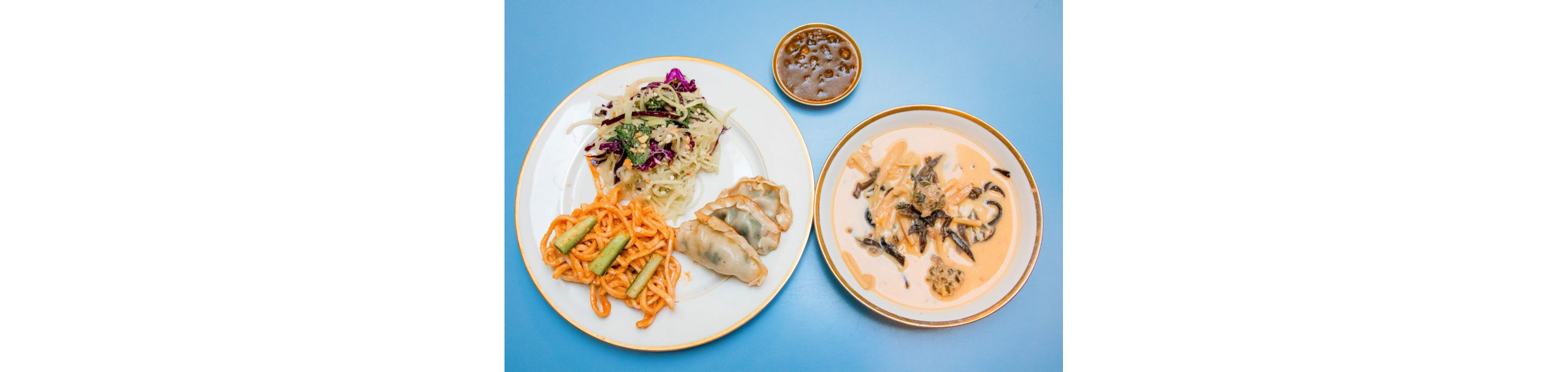 Plates filled with take-and-make orders from Myers + Chang.