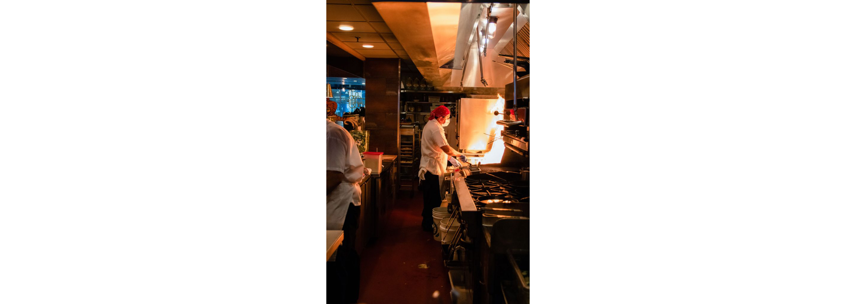 Chefs working in the restaurant kitchen of Myers + Chang.