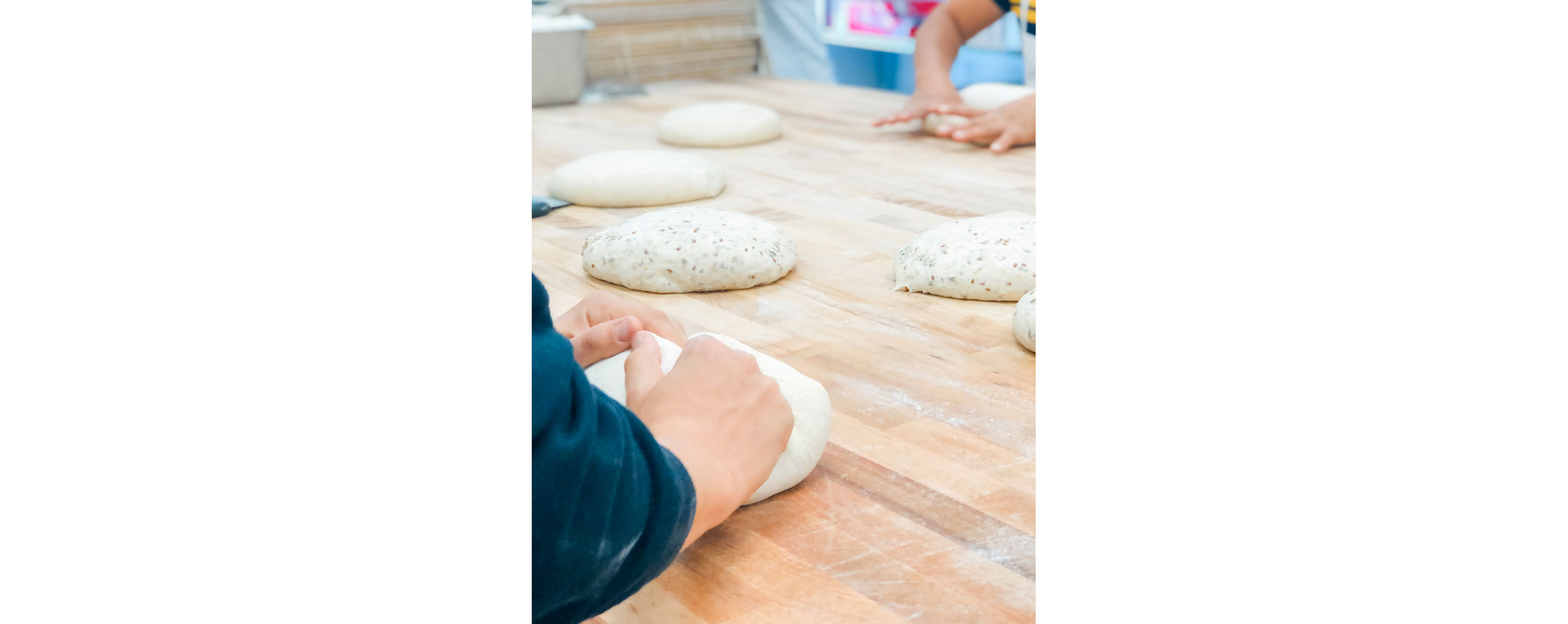 People gently making dough.