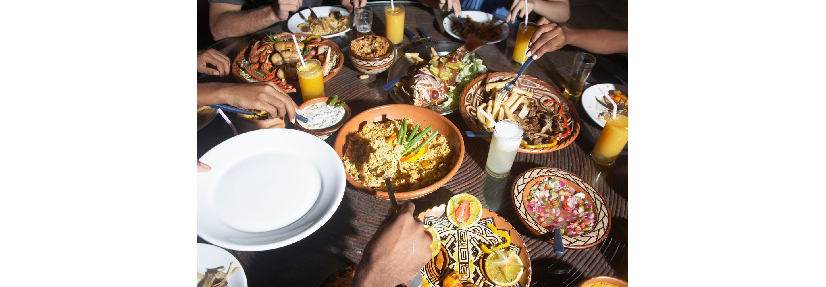 A large table featuring a variety of delicious dishes.