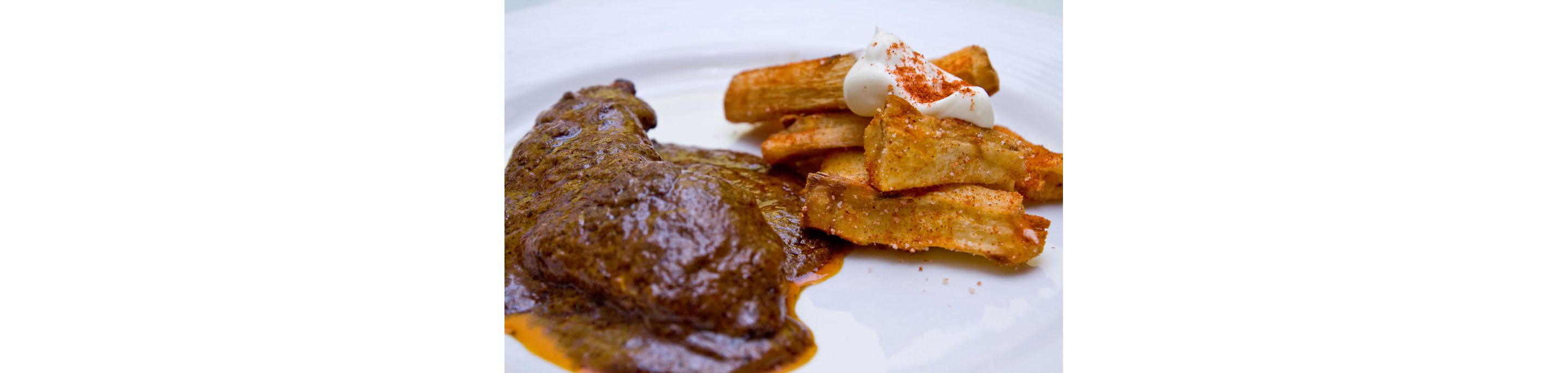 Fried yuca and meat.