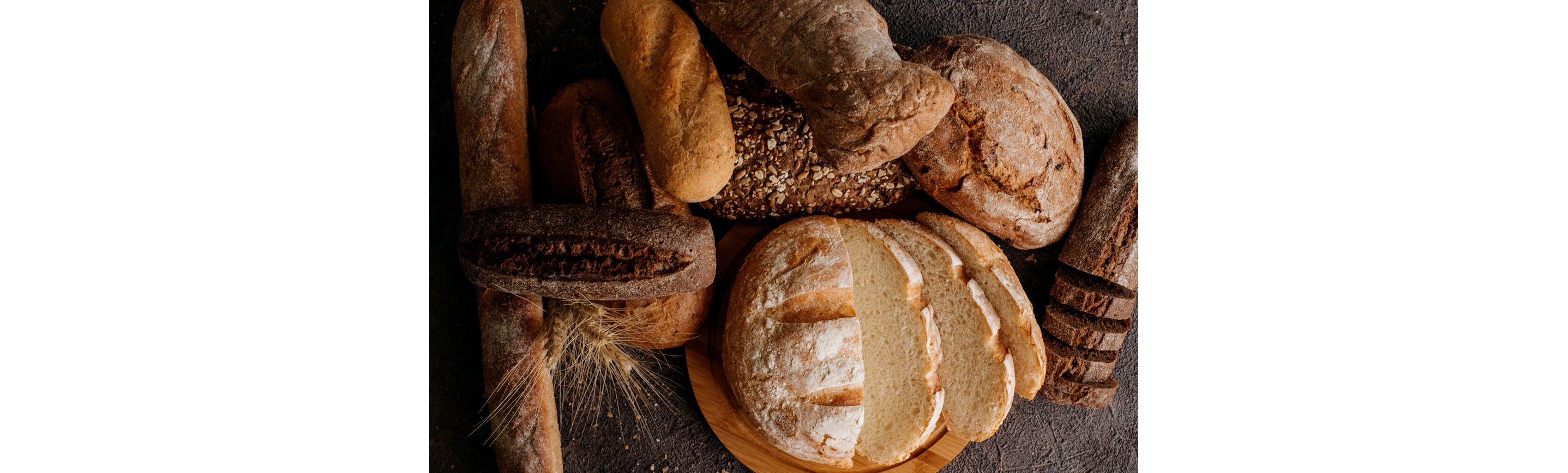 A variety of fresh loaves of bread.