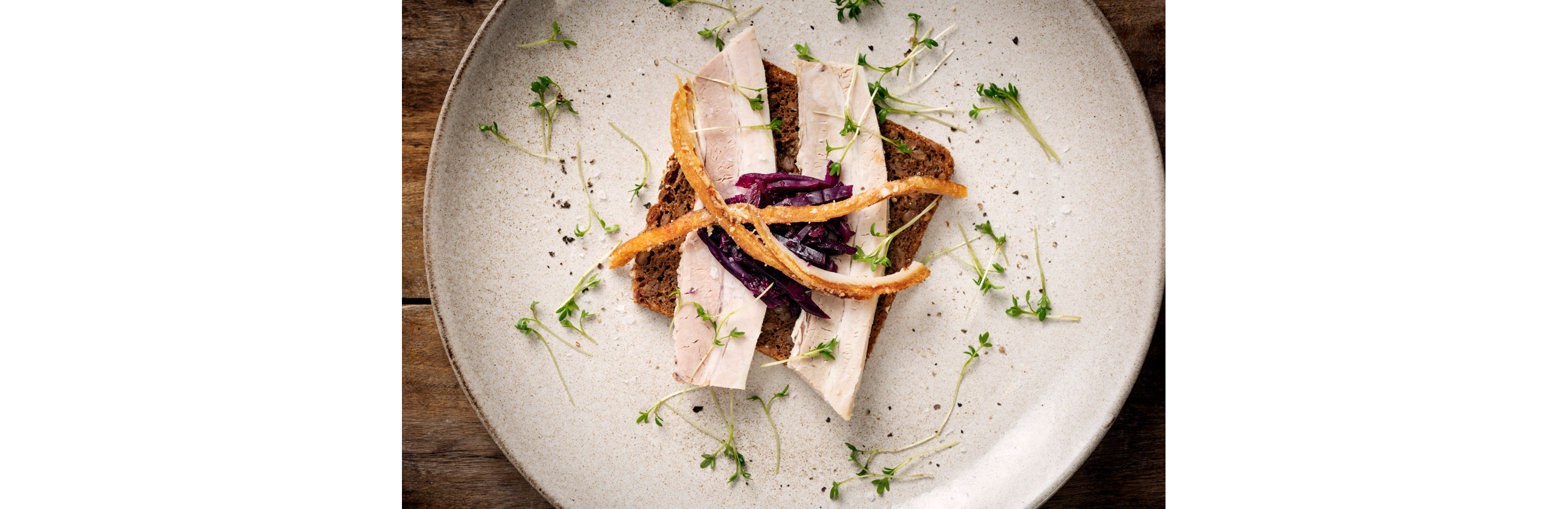 A plated Danish open-faced sandwich.