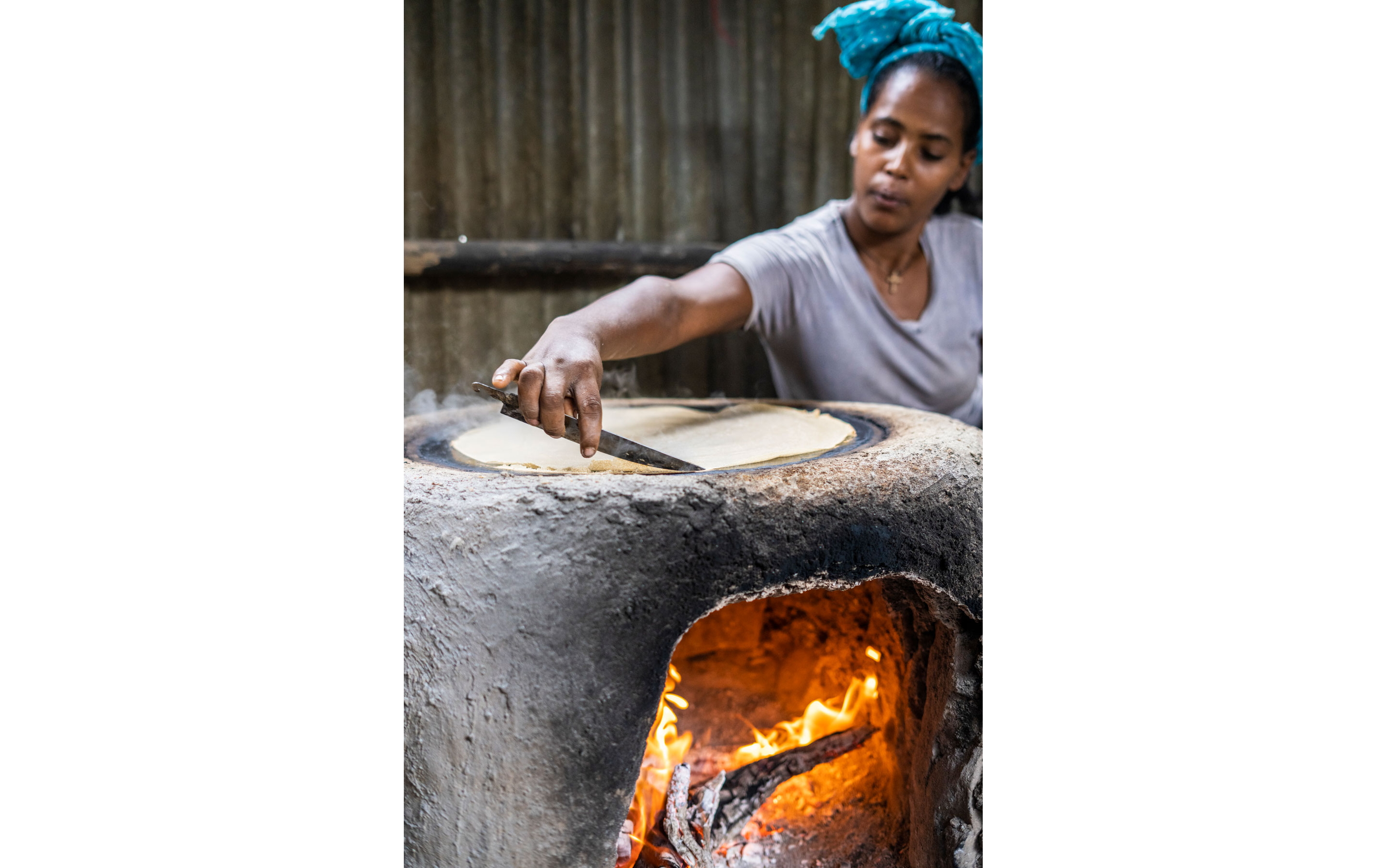 A person making Ethiopian flatbread.