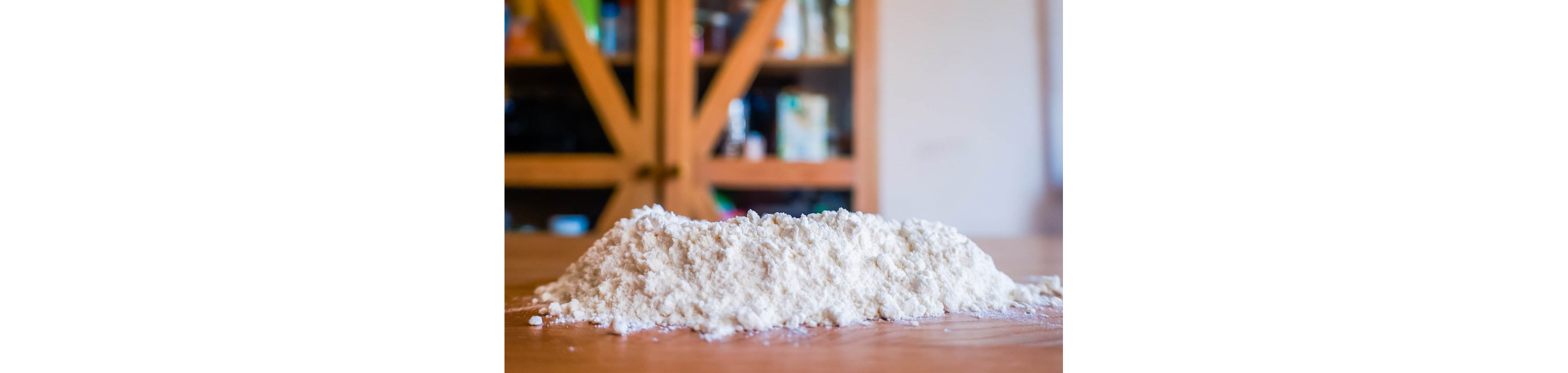 A pile of flour resting on a table.