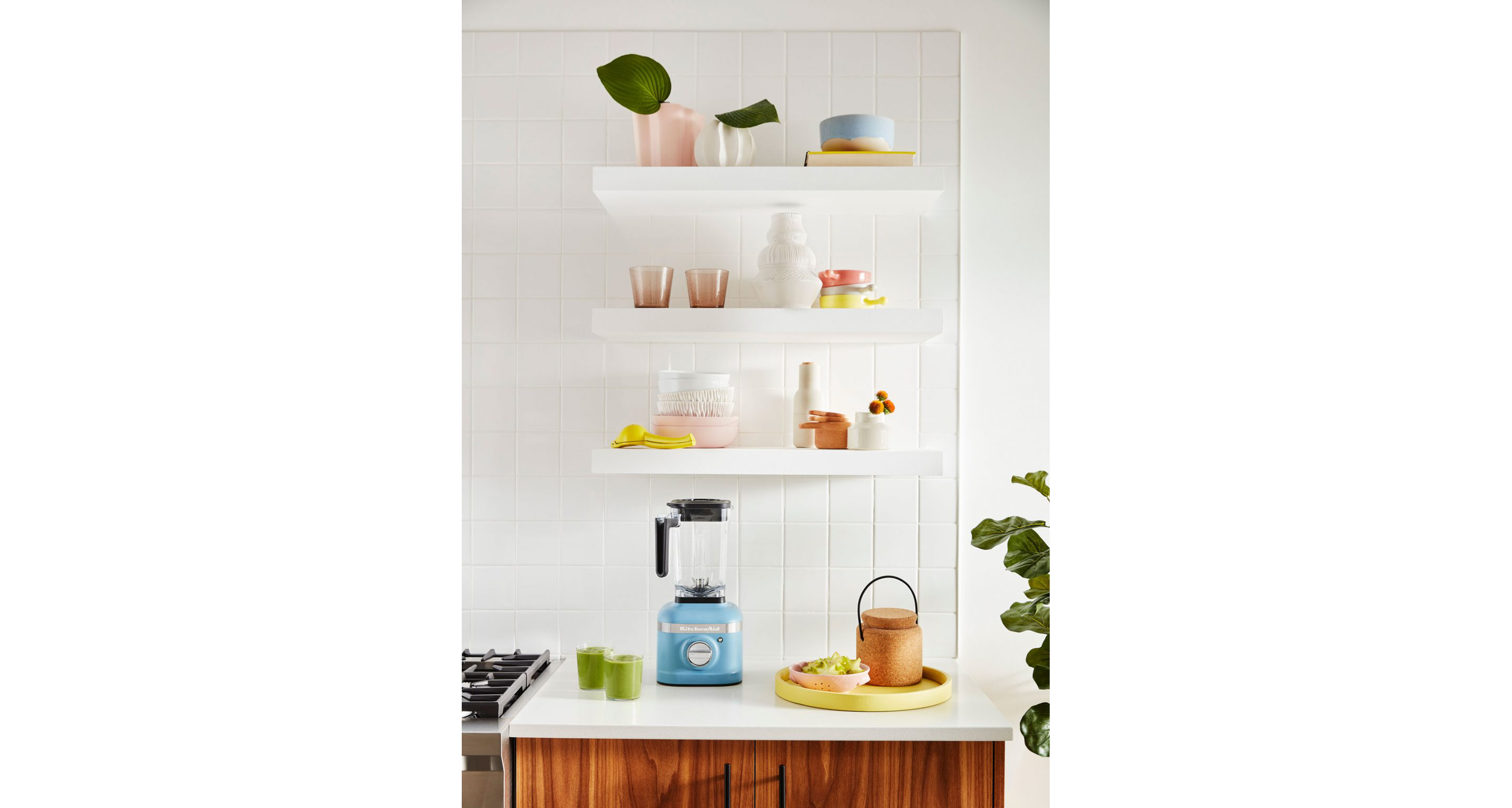 Open shelving with complementary colored dishes.