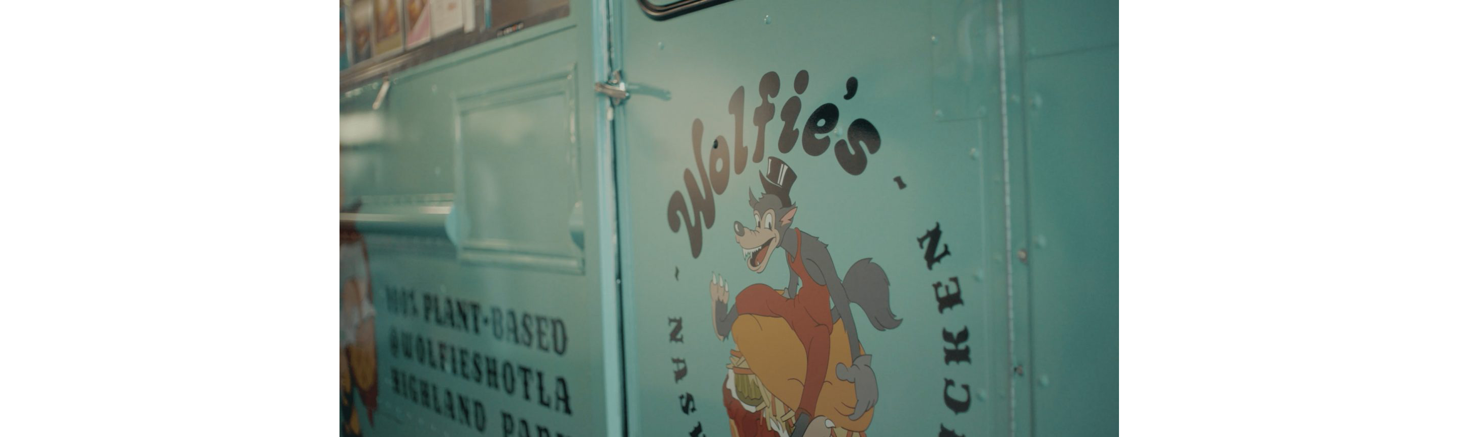 The door of Woflie’s Nashville Hot Chicken food truck.