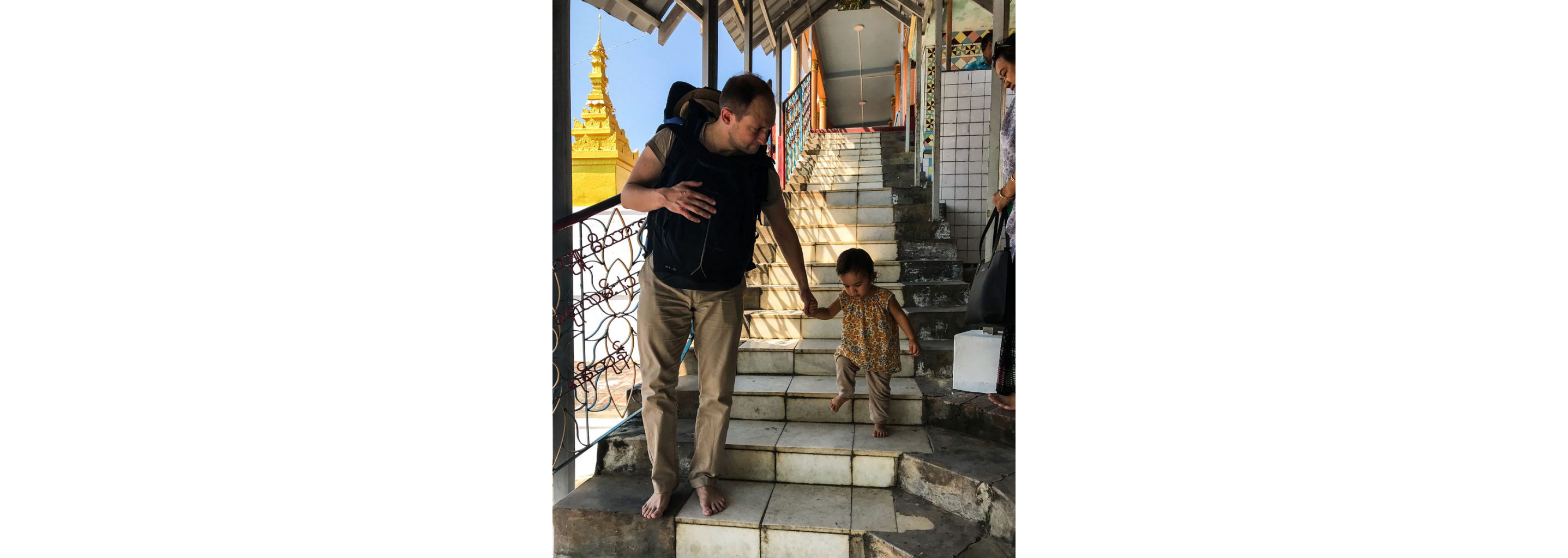 Wee Ling Soh's husband and daughter walking down the stairs.