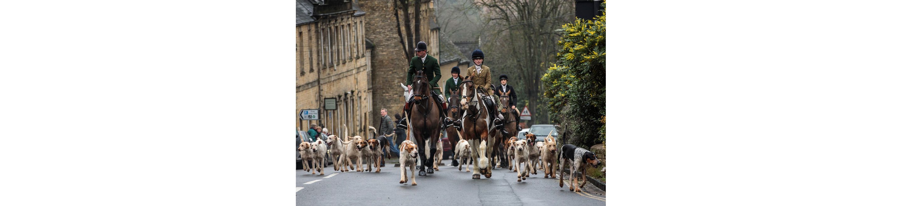People riding on horseback.