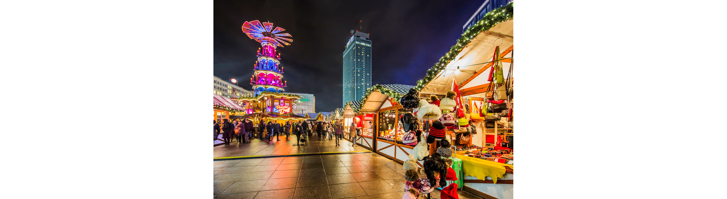 People shopping at a Christmas market.