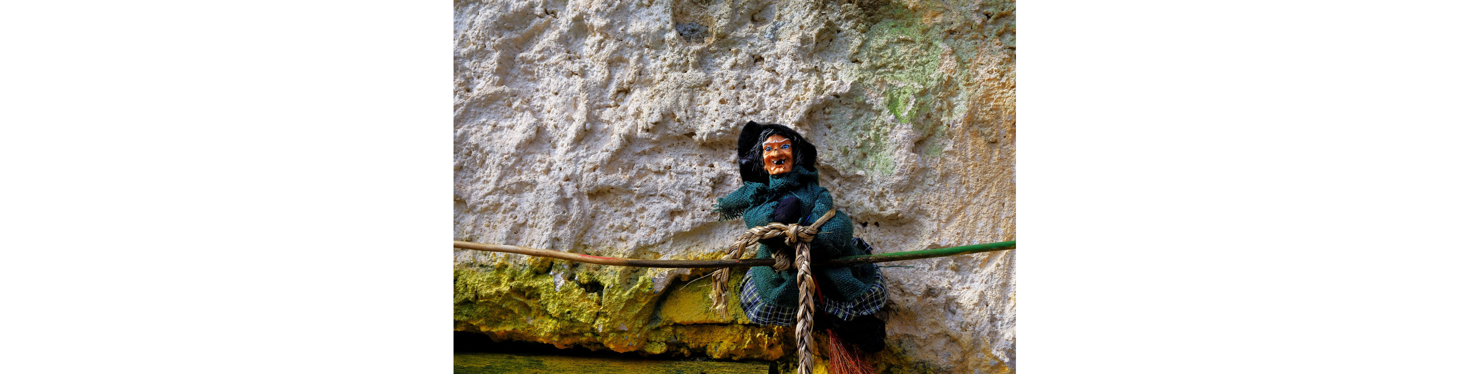 A doll of La Befana, or good witch.