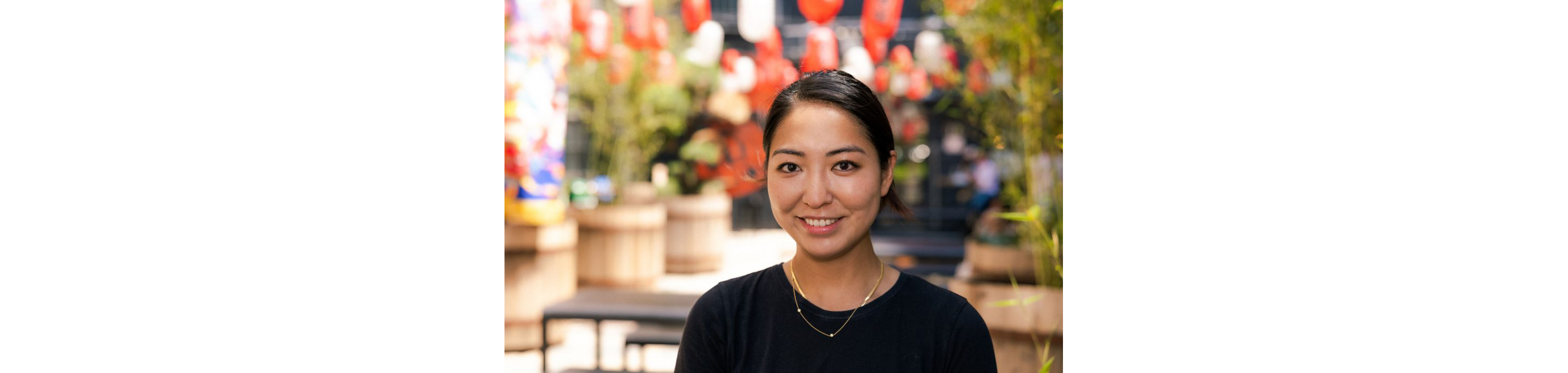 Erina smiling for a photo.