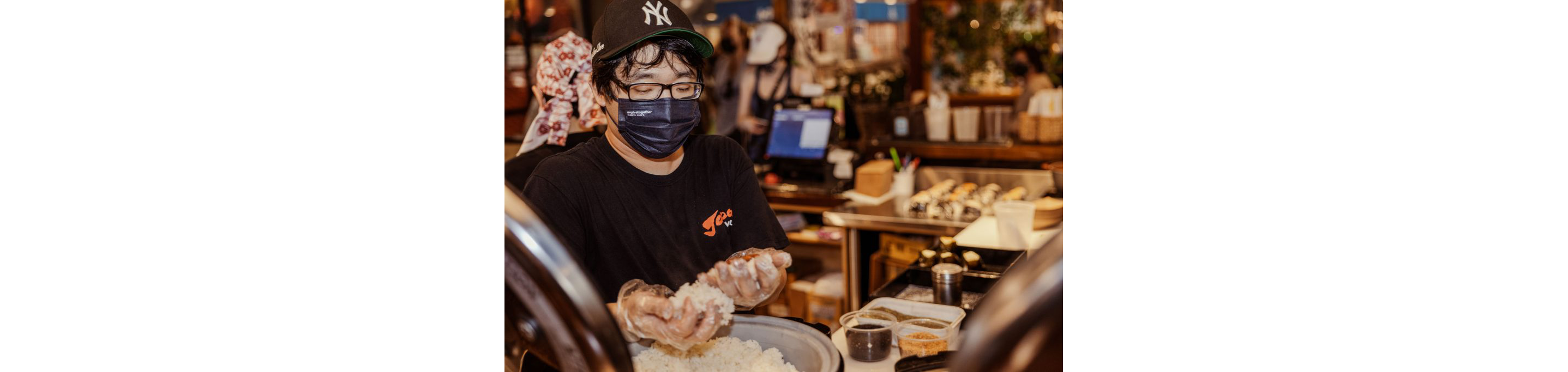 A person making rice balls.